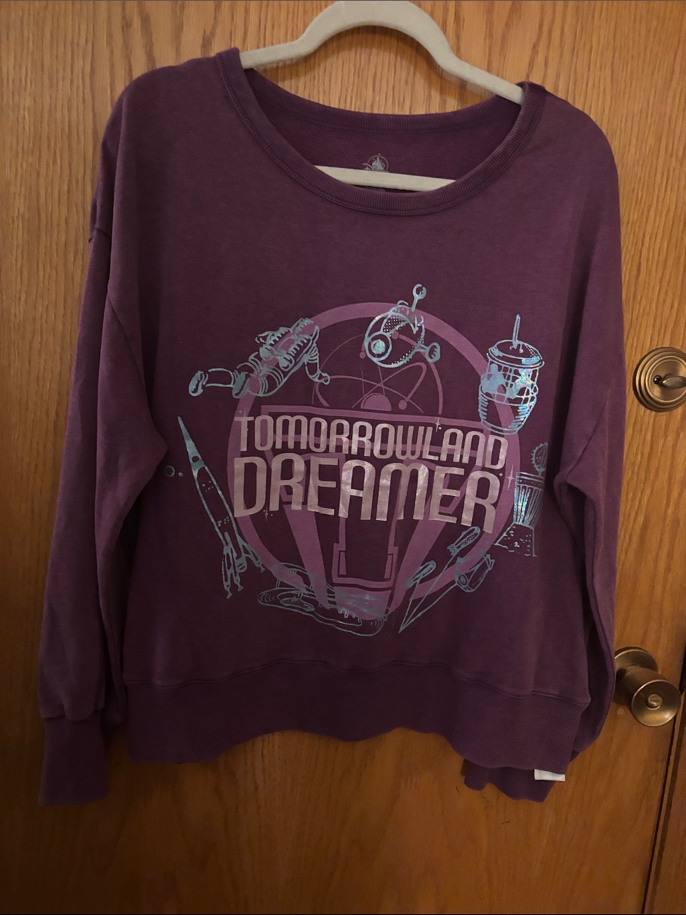 Disney Women's Purple Tomorrowland Dreamer Graphic Crewneck Sweatshirt